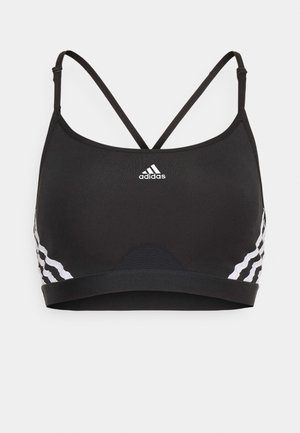 Schwarzer Sport-BH mit dünnen verstellbaren Trägern, einem weißen Adidas-Logo auf der Vorderseite und einem welligen weißen Muster an den Seiten.