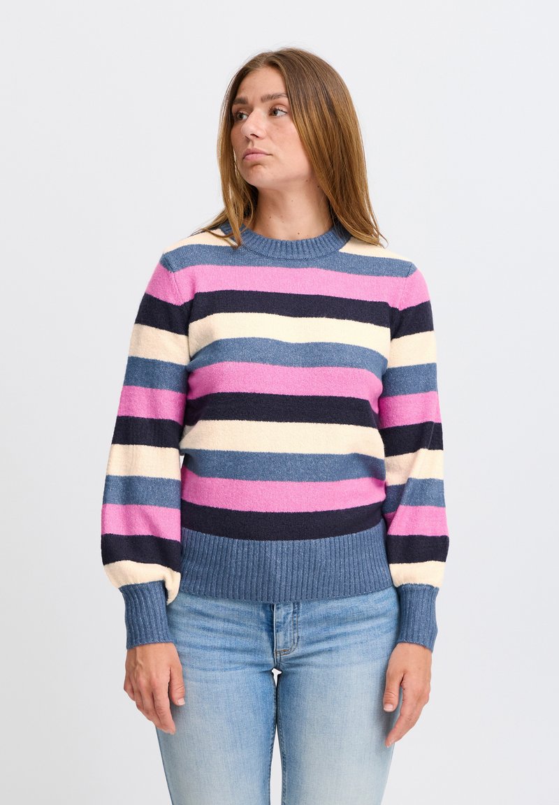 Gestreepte trui met roze, blauw, crème en marine kleuren. Zachte stof met geribde mouwen en zoom, ronde hals ontwerp.