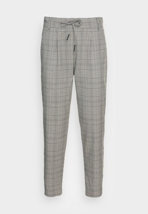 Pantalons à carreaux gris avec une taille à cordon, des jambes fuselées et des détails de plis. Fabriqués dans un tissu léger pour le confort.