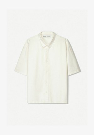 Kurzärmliges Hemd aus off-white Leinen. Mit klassischem Kragen, vorderem Knopfverschluss und lockerer Passform. Minimalistisches Design mit subtiler Textur.