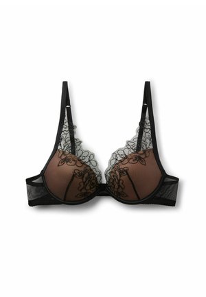 Černá krajková podprsenka s květinovou výšivkou na průsvitných hnědých košíčcích, nastavitelnými ramínky a síťovanými bočními panely, položena na rovný povrch na bílém pozadí.