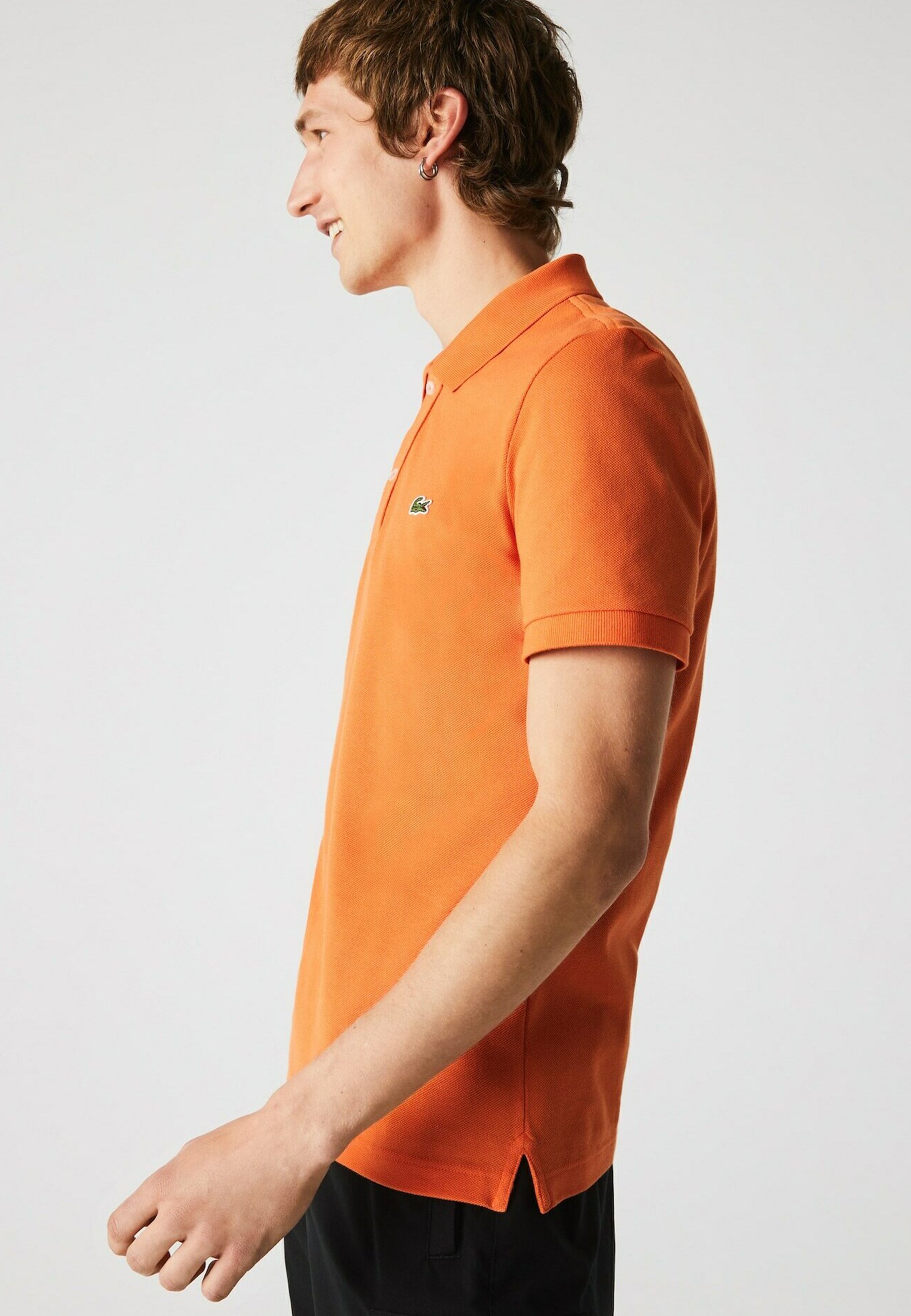 Lacoste Polo shirt - orange/mottled 