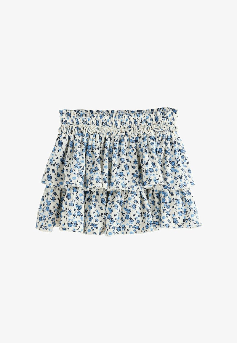 Falda floral con un patrón azul y blanco, que incluye tres volantes en capas y una cintura elástica. Fabricada con tela ligera.