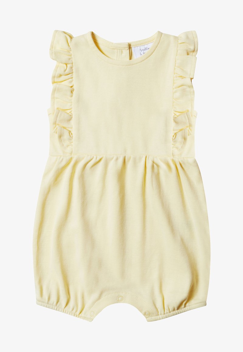 Mono de algodón amarillo con detalles de volantes en los hombros, escote redondo, aperturas elásticas en las piernas y cierre de botón en la espalda.