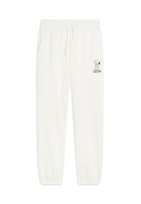 Pantalons de jogging couleur crème avec taille élastique, cordon de serrage et poignets côtelés. Présente un graphique de Snoopy sur la cuisse gauche.
