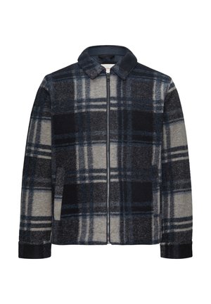 Geruite jas in marineblauw, grijs en zwart. Heeft een ritssluiting aan de voorkant, een kraag, twee voorzakken en een zachte, licht gestructureerde stof.