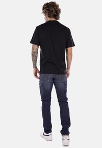 EA7 Emporio Armani T-shirt con stampa - nero