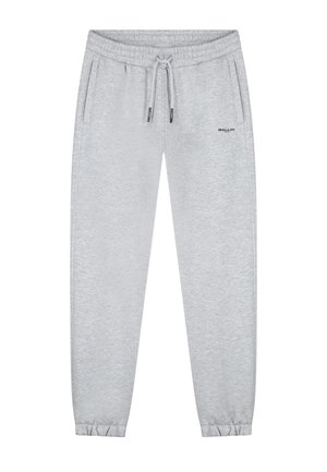 Graue Baumwoll-Jogginghose mit elastischem Bund, Kordelzug und elastischen Bündchen. Verfügt über Seitentaschen und ein schwarzes Textlogo am Oberschenkel.