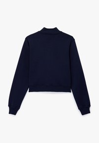 Sudadera recortada de color azul marino con un cuello alto, mangas largas y puños acanalados, que presenta una textura suave y lisa. Se muestra la vista posterior.