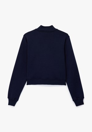 Navy blue cropped sweatshirt with a high collar, long sleeves, and ribbed cuffs, featuring a smooth, soft texture. Back view shown.