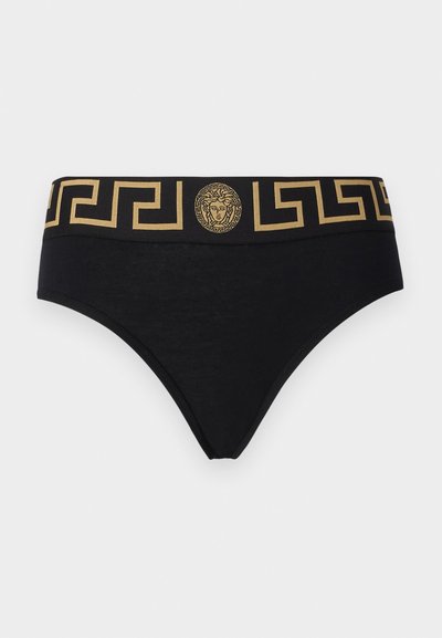 Fekete pamut alsónadrág arany rugalmas derékpánttal, amelyen görög kulcs-minta és Medúza fej logó található az elülső középső részen.