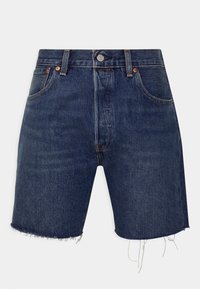 Denimshorts i mörkblått med fransad nederkant, med en klassisk femficksdesign och detaljer i kopparfärgad hårdvara.
