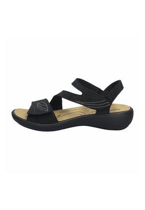 Black sandals made of soft suede with a cushioned insole. Features multiple cross straps and a contoured wedge sole for support.