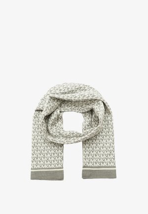 Écharpe en tricot beige et blanche avec un motif répétitif "MK" et des bords côtelés, pliée avec une boucle au centre sur un fond blanc.