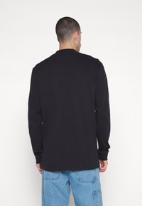Nike Sportswear MOCK NECK - Bluză de molton - black