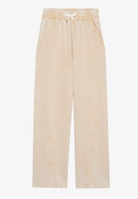Beige vide benbukser laget av mykt stoff, med elastisk liv med snøring, foran lommer og subtil teksturdetalj.