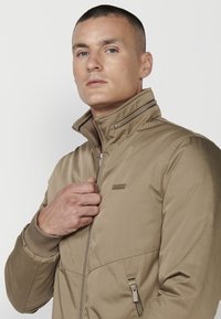 Koroshi Geacă bomber - beige