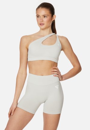 SQUATPROOF EVE SEAMLESS ONE SHOULDER - Light support sports bra - beige