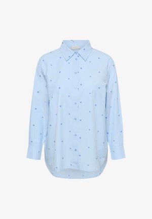 Hele sinine puuvillast triiksärk, millel on laiali pillatud väikesed sinised südamekujulised mustrid, pikkade varrukatega ja klassikalise kraekujundusega.