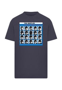 Navy cotton t-shirt featuring a graphic design of black and white faces arranged in a grid, titled "The Beatles A Hard Day's Night."