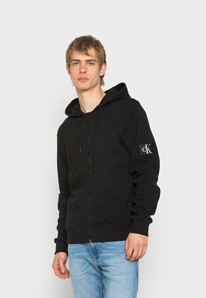 MONOGRAM BADGE - Mikina na zip - black