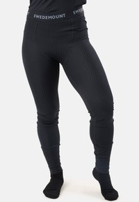 Svarta, ribbade sportleggings med hög midja och "SWEDEMOUNT"-logotyp. Slätt material med en tight passform.
