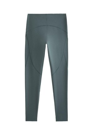Leggings grigi a tutta lunghezza con cuciture curve e vita alta, mostrati distesi su uno sfondo bianco.