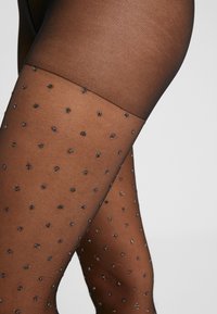 DIM 20 DEN SHINY PLUMETIS TIGHT - Tights - black/silver