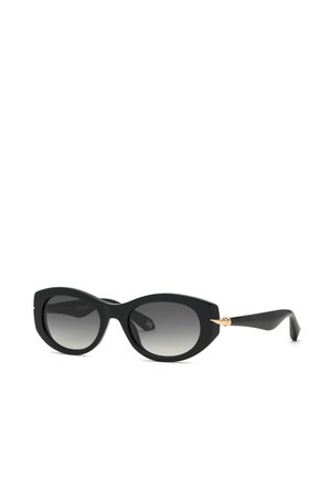 Lunettes de soleil noires forme œil de chat avec verres foncés dégradés et détail doré incurvé sur les branches, présentées sur fond blanc.