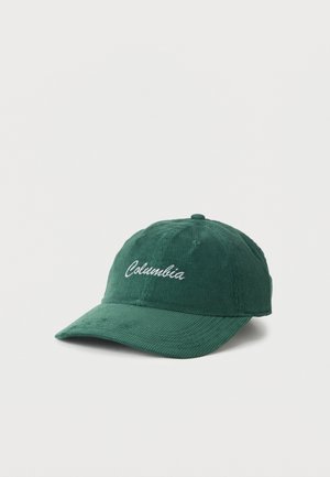 Casquette de baseball en velours côtelé vert avec une visière incurvée et le logo "Columbia" brodé en blanc sur le devant.