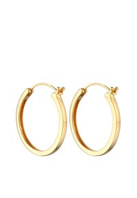 Goldene Creolen mit glänzender Oberfläche. Glattes, kreisförmiges Design mit einem klappbaren Verschluss, das eine polierte Innenfläche und eine leichte Dicke aufweist.