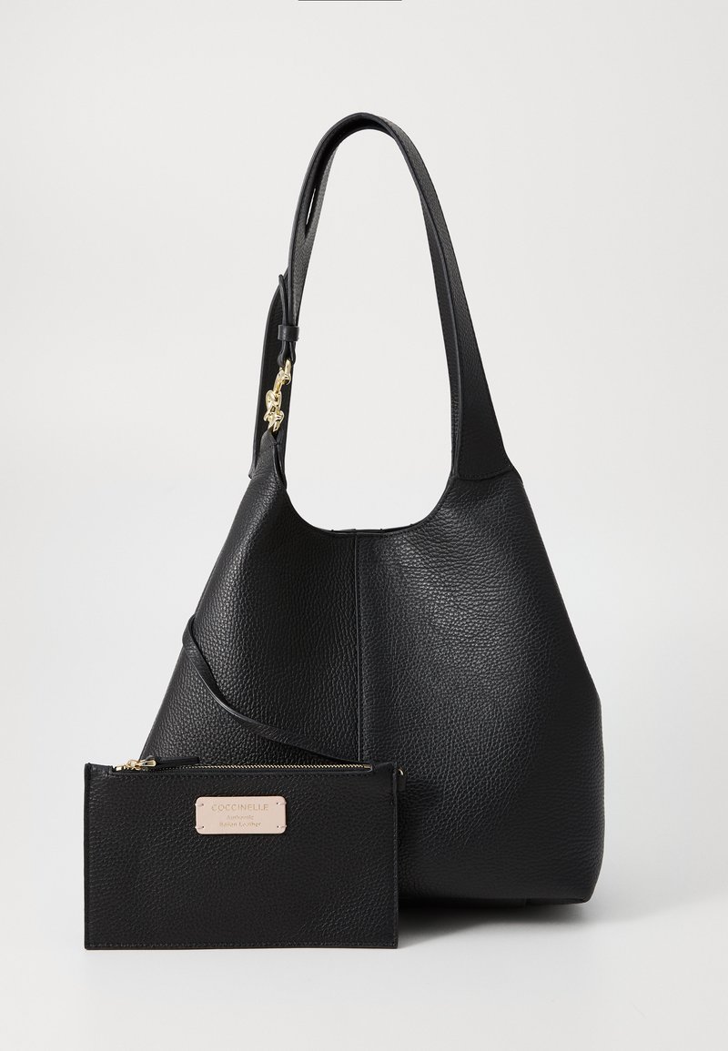 Black leather handbag with a textured finish and a wide strap. Includes a small black zippered pouch with a gold accent.