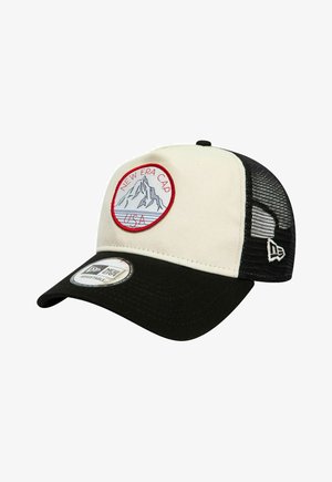 Regelbare pet met ecru voorzijde, zwarte mesh achterkant, zwarte klep en een geborduurde ronde patch met afbeelding van een berg en tekst "New Era Cap USA".