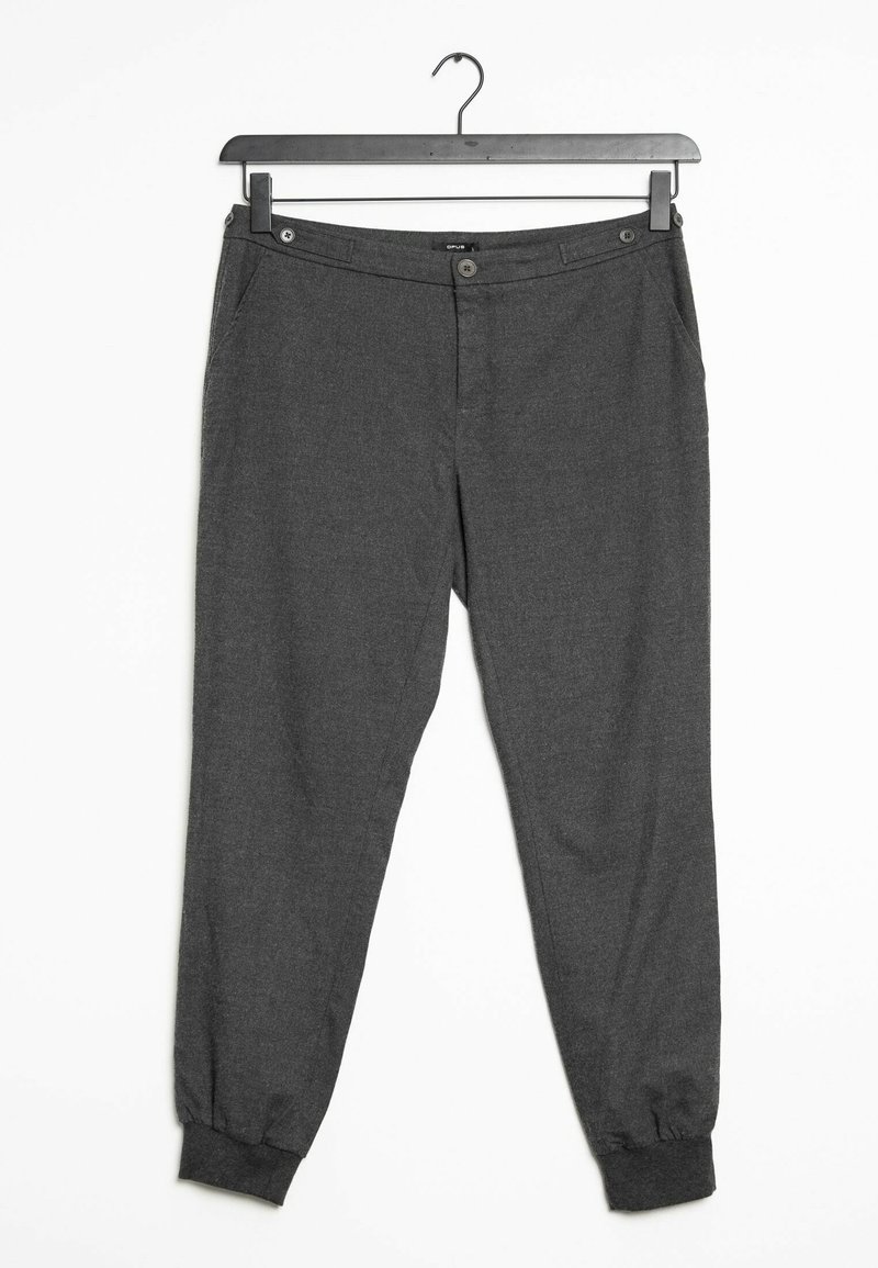 Gray tapered pants made of a textured fabric with an elastic cuff at the ankle. Features a button closure and front pockets.