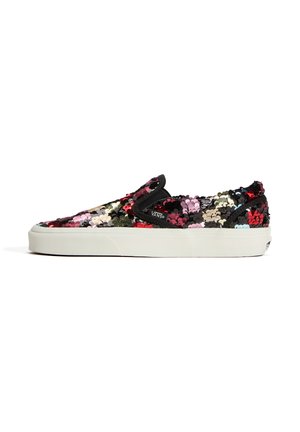Basket Vans slip-on recouverte de sequins multicolores avec une semelle en caoutchouc blanche et une bordure noire.