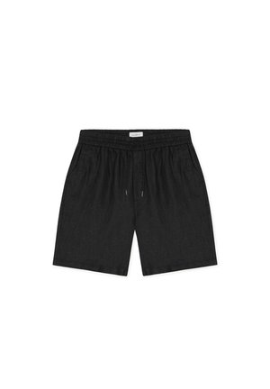 Short décontracté noir avec taille élastique et cordon, doté de poches latérales et d'une coupe relax, posé à plat sur un fond blanc.