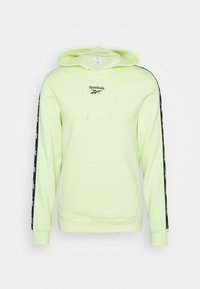 Hoodie vert citron avec une poche kangourou, rayures noires sur les manches arborant un logo blanc, et cordon de serrage réglable pour la capuche.