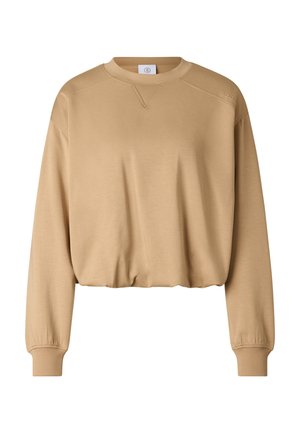 Sweat-shirt court beige à manches longues avec poignets côtelés et encolure ronde, avec des détails subtils de couture près des épaules et du col.