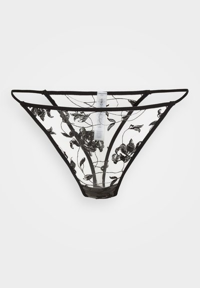 Black lace thong featuring floral embroidery and a sheer design. It has slender straps and a minimal coverage shape, with a smooth waistband.