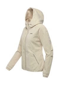 Lichtbeige capuchonvest gemaakt van gestructureerde stof. Voorzien van een volledige ritssluiting aan de voorkant, twee zijzakken en elastische manchetten.