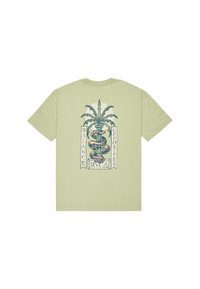 Camiseta de algodón verde claro con un gráfico en la parte posterior que representa una planta estilizada y una serpiente con el texto "EQUILIBRAR OPUESTOS".