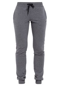 Szare spodnie dresowe wykonane z miękkiego materiału, wyposażone w elastyczną talię ze sznurkiem, boczne kieszenie i ściągacze przy kostkach.