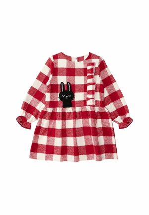 Robe à manches longues à carreaux rouges et blancs avec taille froncée, détail volanté sur le devant et un visage de lapin noir brodé sur la poitrine.