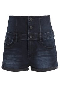 Džíny s vysokým pasem vyrobené z tmavého denimu, se třemi knoflíky, ohrnutými lemy, dvěma předními kapsami a hladkou texturou. Materiál má jemné vymývání.