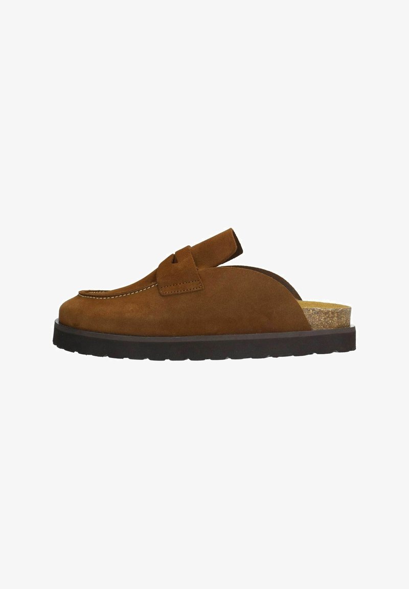 Brown suede slip-on shoe with a rounded toe, exposed heel, and a cork insole. Features contrast stitching and a thick rubber outsole.