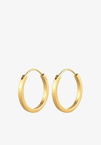 Seleccionado, gold-coloured