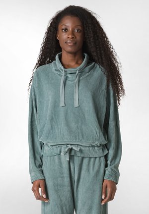 Teal, geribbelde top met lange mouwen en een kraag met koord. Zachte stof, relaxte pasvorm, met elastische taille en lange mouwen.