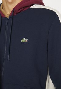 Lacoste ELEVATED COLORBLOCK UNISEX - Mikina so zipsom - navy blue/zin lapland