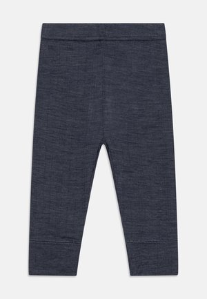 Leggings gris anthracite fabriqués en tissu texturé. Dotés d'une taille lisse et d'un design ajusté avec des coutures aux chevilles.