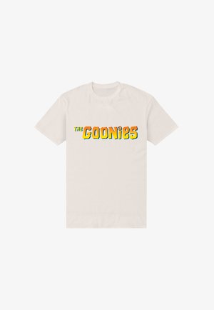 Beige T-shirt met korte mouwen met het tekstlogo "The Goonies" in vetgedrukte oranje en gele letters gecentreerd op de voorkant.